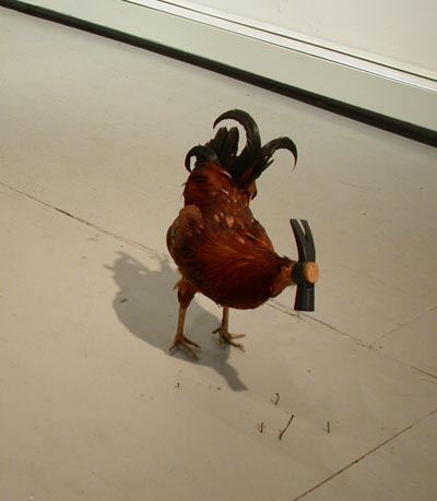 <i>The Cock</i>, 2003, stuffed animal, mixed media
