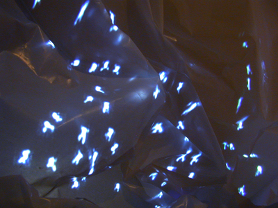 <i>Untitled (Plastic Mountain) [detail]</i>, 2006, video projection, plastic, wood, overall: 5 7/32 x 14 13/32 x 10 ft (1.58 x 4.37 x 3.05 m)
