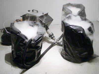 <i>Whoosh</i>, 2005, plastic, cardboard, fog machine