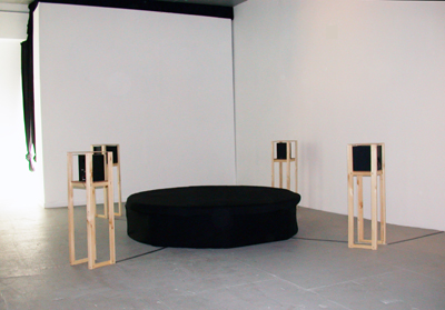 <i>A Little Light Music</i>, 2006, sound installation: CD player, four speakers, speaker housings, amplifier, seating area, 10'38 minutes, edition of 3