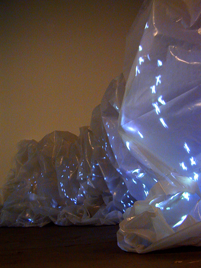 Untitled (Plastic Mountain), 2006, video projection, plastic, wood, overall: 5.2 x 14.4 x 10 ft (1,58 x 4,37 x 3,05 m)