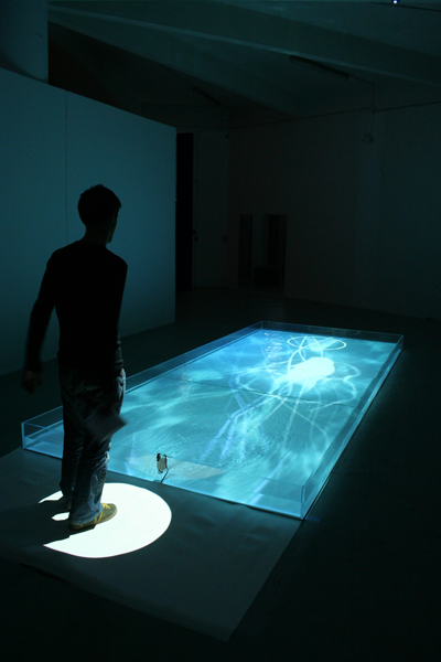 Electronic Shadow, <i>Ex-îles</i>, 2003-2007, Plexiglas pool, water, video-projector, computer, floor-sensor, water-pump, 6 x 31 1/2 x 94 1/2 inches (15 x 80 x 240 cm)