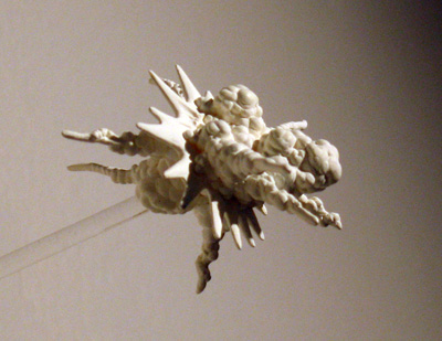 <i>Untitled (Big Bang 2)</i> [detail], 2006, cast resin, plexiglass, 1 inch diameter, edition 1 of 4